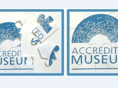 A puzzle of the Accreditation logo - uncompleted and completed